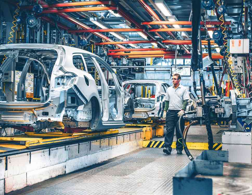 Automotive production line with automated material handling systems